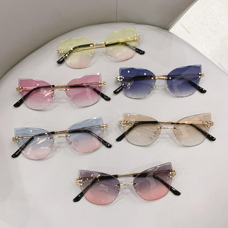 Fashion Cat Eye Gradient Sunglasses 2025 UV Resistant Rimless Eyeglasses Manufacturer (3) Cat eye gradient rimless sunglasses