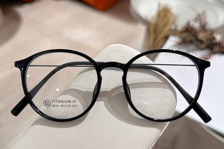 XM6835 Tea-Colored Round Titanium Eyeglass