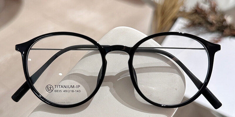 XM6835 Tea-Colored Round Titanium Eyeglass